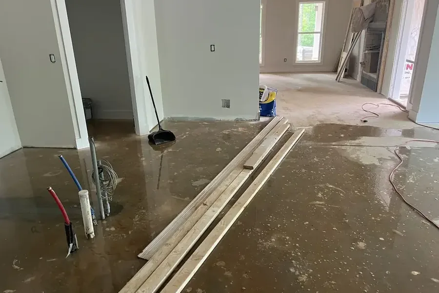 Water spraying from a failed supply pipe inside a home